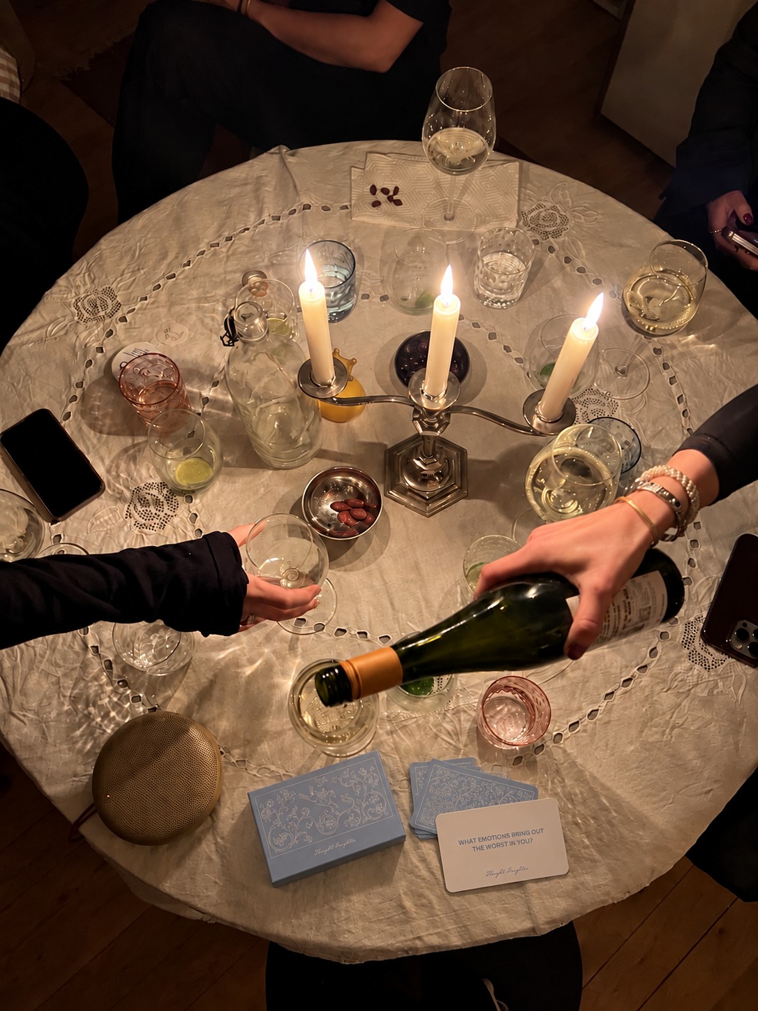 Thought Daughter cards and drinks on an outdoor café table